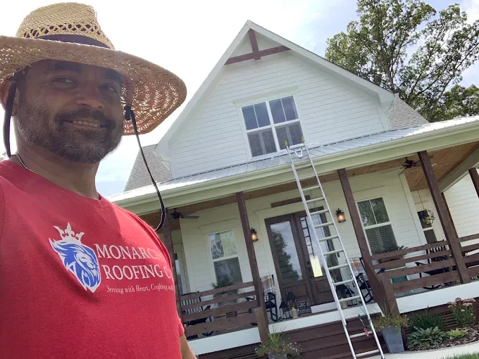 Matt Burkhardt on-site at a completed Monarchs Roofing Co. project