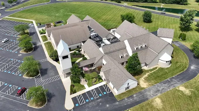 Aerial view of a completed commercial roof replacement